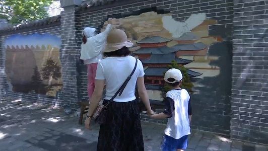 z5046e16605088e2fc0b37ed93c916597 西安市の古い壁が唐代風の壁画に変身　陝西省